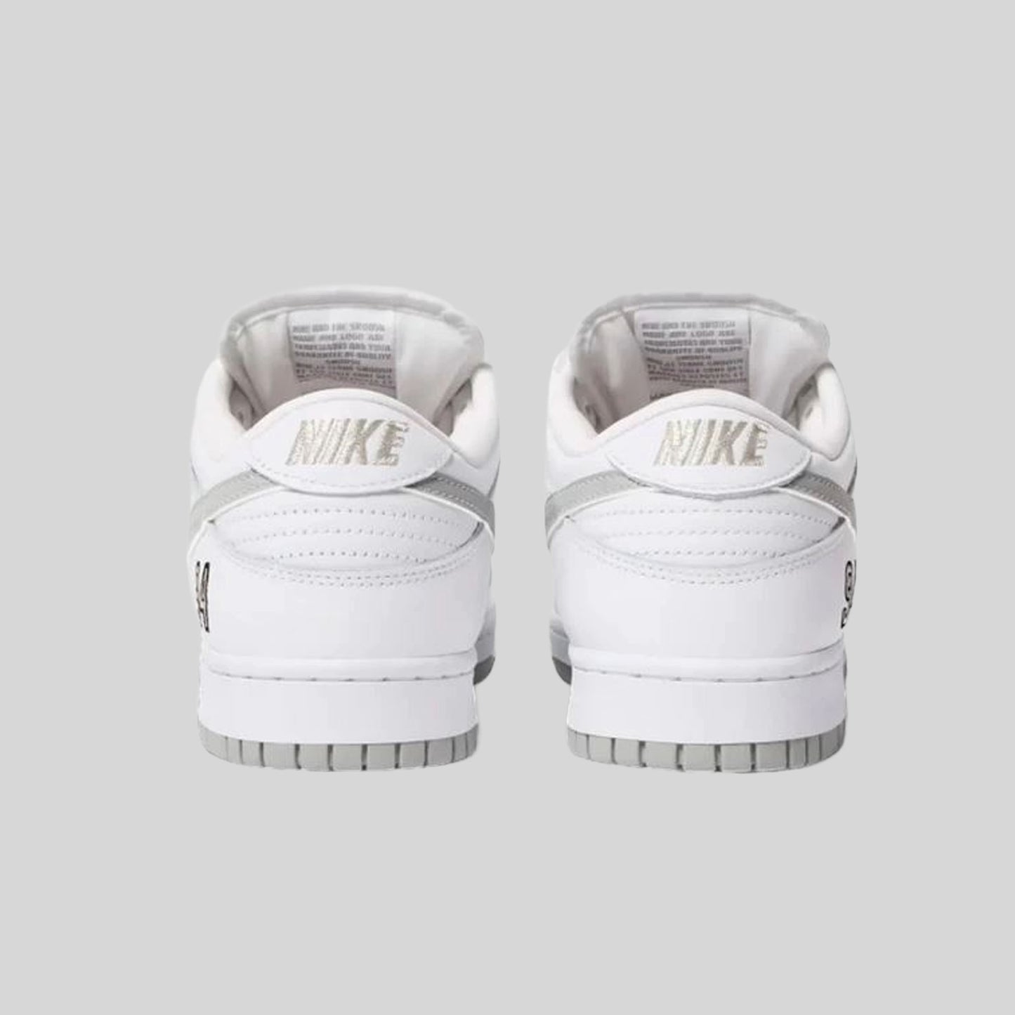 Nike SB Dunk Low Supreme 94 White Metallic Silver